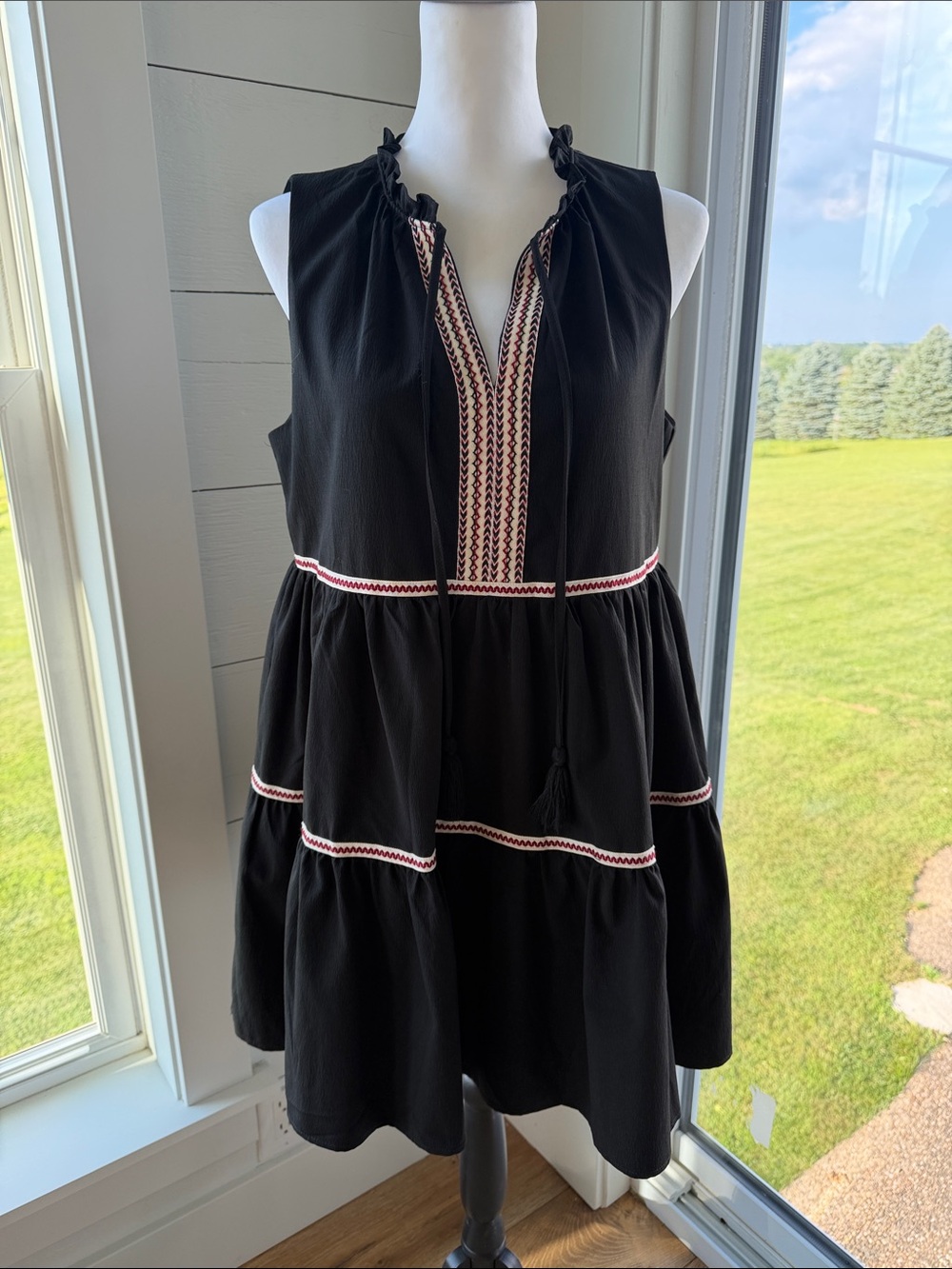 Sleeveless Black Tiered Mini Dress with Embroidered Trim